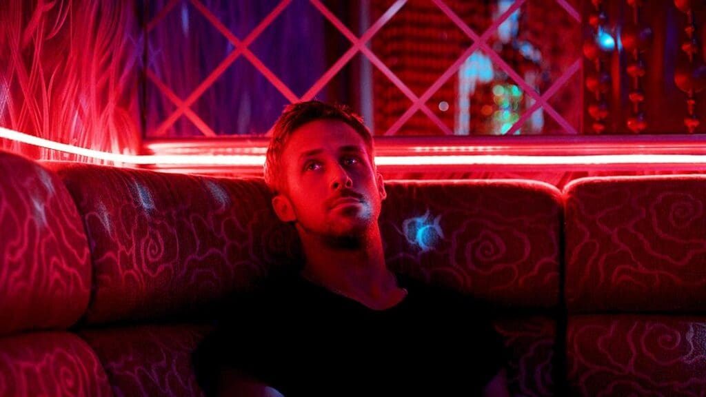 Ryan Gosling sentado