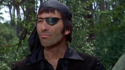 Christopher Lee interpretando a un pirata con parche en el ojo en The Pirates of Blood River (1962), clásico de aventuras de Hammer Films.